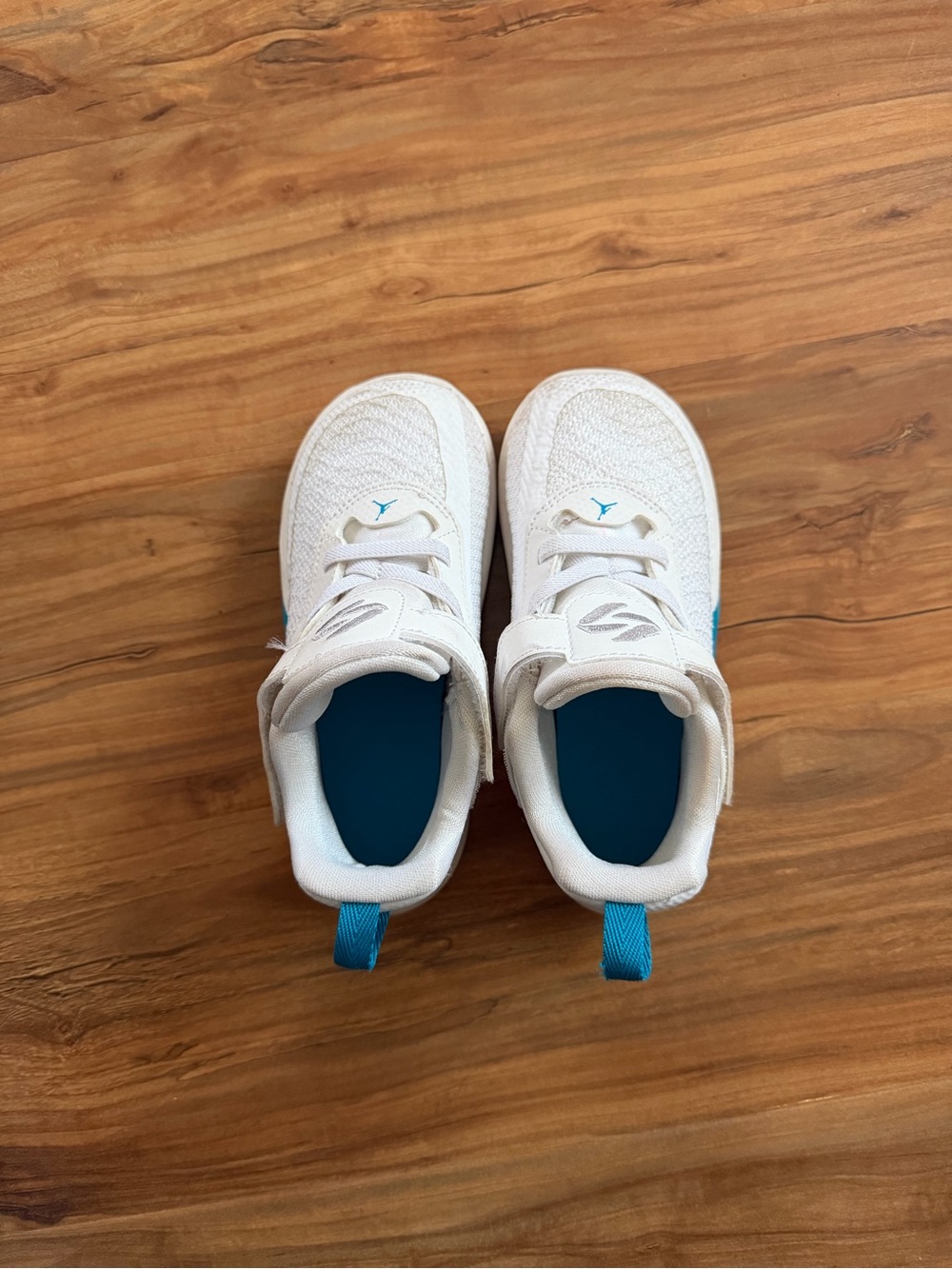 Jordan White Kids Sneakers with Teal Trim
